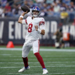 
              New York Giants quarterback Daniel Jones prepares to throw a pass against the New England Patriots during the first half of a preseason NFL football game Thursday, Aug. 11, 2022, in Foxborough, Mass. (AP Photo/Charles Krupa)
            