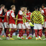 
              Arsenal's team player celebrate as they won the English Premier League soccer match between Arsenal and Aston Villa at the Emirates Stadium in London, Wednesday, Aug. 31, 2022. (AP Photo/David Cliff)
            