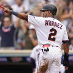 
              Minnesota Twins' Luis Arraez celebrates after scoring during the fifth inning of a baseball game against the San Francisco Giants Sunday, Aug. 28, 2022, in Minneapolis. (AP Photo/Abbie Parr)
            