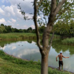 
              A man fishes in a pond in Kramatorsk, Donetsk region, eastern Ukraine, Wednesday, Aug. 3, 2022. (AP Photo/David Goldman)
            