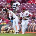 
              Cincinnati Reds second baseman Alejo Lopez (35) catches a fly ball hit by St. Louis Cardinals' Nolan Arenado during the first inning of a baseball game Wednesday, Aug. 31, 2022, in Cincinnati. At right is first baseman Donovan Solano. (AP Photo/Jeff Dean)
            