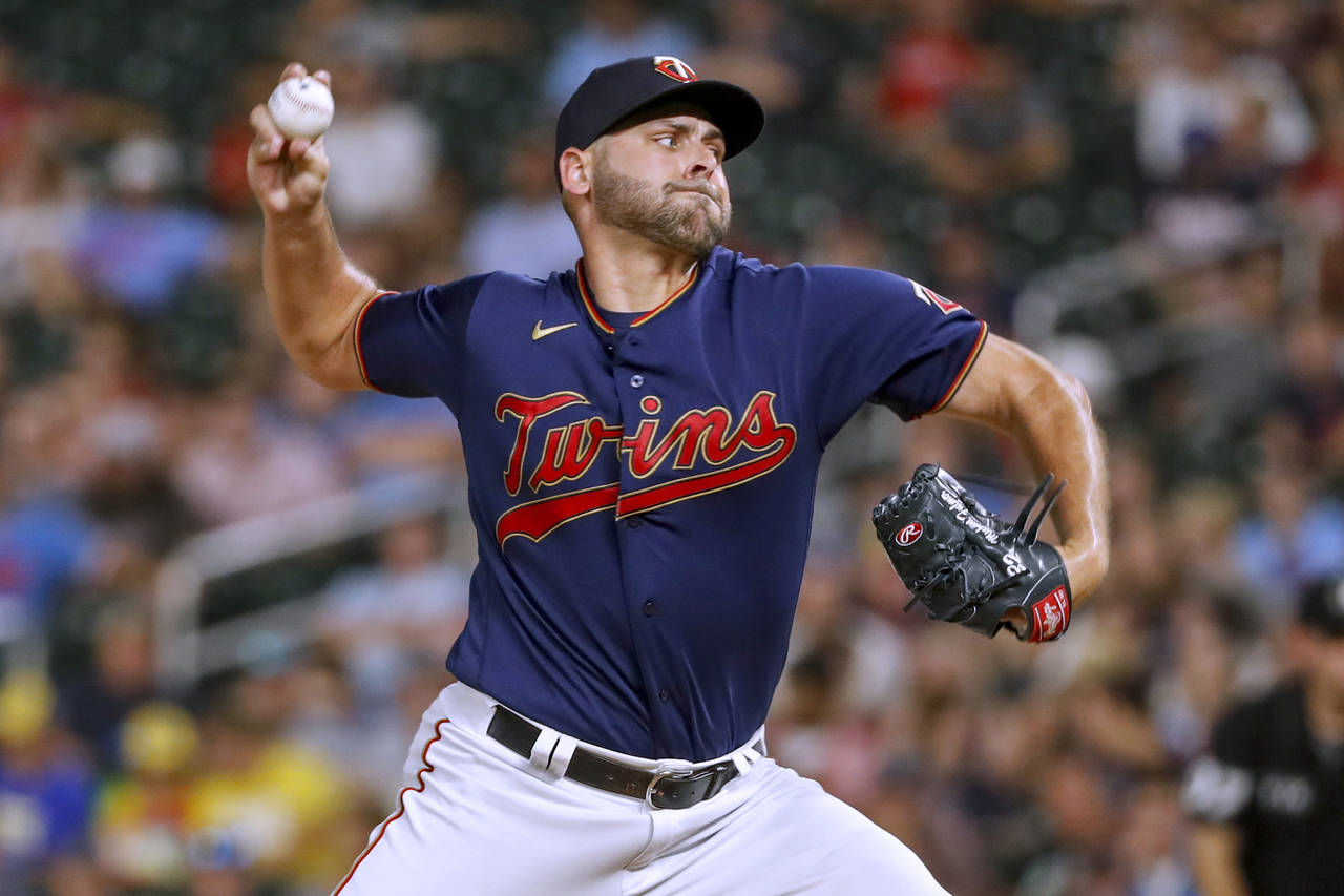 Minnesota Twins relief pitcher Michael Fulmer throws to a Toronto Blue Jays batter during the 10th ...