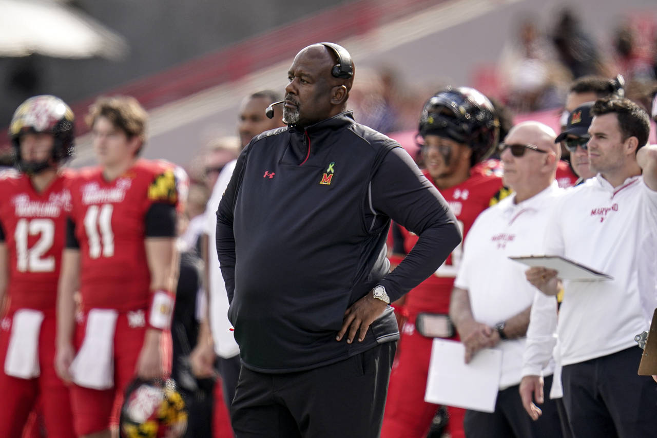 FILE - Maryland head coach Mike Locksley looks on during the first half of an NCAA college football...