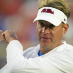 
              FILE - Mississippi head coach Lane Kiffin gestures following his team's 31-17 win over LSU during an NCAA college football game in Oxford, Miss., Saturday, Oct. 23, 2021. Mississippi coach Lane Kiffin signed 17 players from the transfer portal. The group is ranked the No. 2 transfer portal class by 247Sports.(AP Photo/Rogelio V. Solis, File)
            