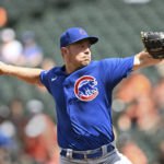
              CORRECTS DAY OF WEEK TO THURSDAY - Chicago Cubs pitcher Adrian Sampson throws against the Baltimore Orioles in the first inning of a baseball game, Thursday, Aug. 18, 2022, in Baltimore. (AP Photo/Gail Burton)
            