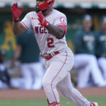
              Los Angeles Angels' Luis Rengifo celebrates after hitting a home run against the Oakland Athletics during the first inning of a baseball game in Oakland, Calif., Monday, Aug. 8, 2022. (AP Photo/Jeff Chiu)
            
