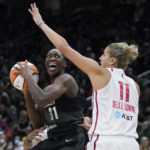 
              Seattle Storm center Tina Charles, left, tries to shoot around the defense of Washington Mystics forward Elena Delle Donne (11) during the first half of a WNBA basketball playoff game, Sunday, Aug. 21, 2022 in Seattle. (AP Photo/Ted S. Warren)
            