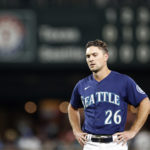 SEATTLE, WASHINGTON - SEPTEMBER 27: Adam Frazier #26 of the Seattle Mariners reacts after flying out against the Texas Rangers during the fifth inning at T-Mobile Park on September 27, 2022 in Seattle, Washington. (Photo by Steph Chambers/Getty Images)