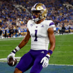 PASADENA, CALIFORNIA - SEPTEMBER 30:  Rome Odunze #1 of the Washington Huskies celebrates a touchdown in the first quarter against the UCLA Bruins at Rose Bowl on September 30, 2022 in Pasadena, California. (Photo by Ronald Martinez/Getty Images)
