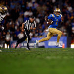 PASADENA, CALIFORNIA - SEPTEMBER 30:  Dorian Thompson-Robinson #1 of the UCLA Bruins throws against the Washington Huskies in the second quarter at Rose Bowl Stadium on September 30, 2022 in Pasadena, California. (Photo by Ronald Martinez/Getty Images)