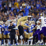 PASADENA, CALIFORNIA - SEPTEMBER 30:  Dorian Thompson-Robinson #1 of the UCLA Bruins runs agains the Washington Huskies in the second quarter at Rose Bowl Stadium on September 30, 2022 in Pasadena, California. (Photo by Ronald Martinez/Getty Images)