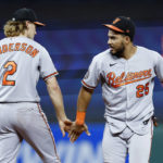 
              Baltimore Orioles third baseman Gunnar Henderson (2) and right fielder Anthony Santander (25) celebrate the team's 3-0 win against the Cleveland Guardians in a baseball game Thursday, Sept. 1, 2022, in Cleveland. (AP Photo/Ron Schwane)
            