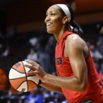 
              Las Vegas Aces' A'ja Wilson warms up for Game 3 of the basketball team's WNBA Finals against the Connecticut Sun, Thursday, Sept. 15, 2022, in Uncasville, Conn. (AP Photo/Jessica Hill)
            