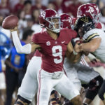 
              Alabama quarterback Bryce Young (9) throws a pass during the first half of the team's NCAA college football game against Vanderbilt, Saturday, Sept. 24, 2022, in Tuscaloosa, Ala. (AP Photo/Vasha Hunt)
            