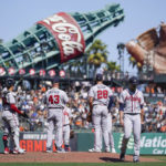 
              Atlanta Braves starting pitcher Charlie Morton, right, is pulled from a baseball game against the San Francisco Giants during the sixth inning in San Francisco, Wednesday, Sept. 14, 2022. (AP Photo/Godofredo A. Vásquez)
            