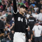 
              Chicago White Sox starting pitcher Dylan Cease gives a thumbs-up as he leaves the field after his team defeated the Minnesota Twins in a baseball game in Chicago, Saturday, Sept. 3, 2022. (AP Photo/Nam Y. Huh)
            