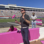
              NASCAR driver Kurt Busch helps paint the pit wall pink during 10th annual recognition of Breast Cancer Awareness Month at Charlotte Motor Speedway in Concord, N.C., Tuesday, Sept. 27, 2022. (AP Photo/Jenna Fryer)
            