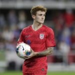 
              FILE - United States' Josh Sargent holds a ball during the second half of a CONCACAF Nations League soccer game against Cuba on Oct. 11, 2019, in Washington. Sargent is back on the U.S. roster for the first time in a year, picked at forward along with Ricardo Pepi and Jesús Ferreira for the Americans’ final two 2022 World Cup warmup matches. (AP Photo/Julio Cortez, File)
            