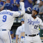 
              Kansas City Royals' Vinnie Pasquantino (9) celebrates with Salvador Perez (13) after hitting a two-run home run during the first inning of the team's baseball game against the Seattle Mariners in Kansas City, Mo., Saturday, Sept. 24, 2022. (AP Photo/Colin E. Braley)
            