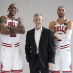 
              Chicago Bulls head coach Billy Donovan, center, DeMar DeRozan (11) and Zach LaVine pose for photographers during the NBA basketball team's Media Day, Monday, Sept. 26, 2022, in Chicago. (AP Photo/Charles Rex Arbogast)
            