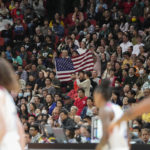 
              Spectators react during the United States versus China game at the women's Basketball World Cup in Sydney, Australia, Saturday, Sept. 24, 2022. (AP Photo/Mark Baker)
            