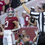 
              Alabama wide receiver Jermaine Burton (3) reacts after scoring the first touchdown of the season during the first half of an NCAA college football game against Utah State, Saturday, Sept. 3, 2022, in Tuscaloosa, Ala. (AP Photo/Vasha Hunt)
            
