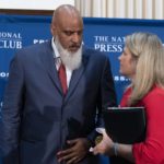 
              Executive Director of the Major League Baseball Players Association Tony Clark speaks with AFL-CIO President Liz Shuler during a news conference at the Press Club in Washington, Wednesday, Sept. 7, 2022. (AP Photo/Jose Luis Magana)
            
