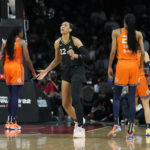 
              Las Vegas Aces forward A'ja Wilson (22) celebrates after a play against the Connecticut Sun during the second half in Game 2 of a WNBA basketball final playoff series Tuesday, Sept. 13, 2022, in Las Vegas. (AP Photo/John Locher)
            