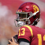 
              Southern California quarterback Caleb Williams (13) throws during the first half of an NCAA college football game against Rice in Los Angeles, Saturday, Sept. 3, 2022. (AP Photo/Ashley Landis)
            