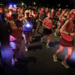 
              Thousands of runners, supporters and mourners attend a 4:20 a.m "Let's Finish Liza's Run" event in honor of Eliza Fletcher on Friday, Sept. 9, 2022 in Memphis, Tenn. Fletcher, was kidnapped and murder while running last week. (Mark Weber/Daily Memphian via AP)
            
