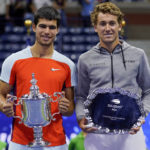 
              Carlos Alcaraz, of Spain, and Casper Ruud, of Norway, pose for a photo after the men's singles final of the U.S. Open tennis championships, Sunday, Sept. 11, 2022, in New York. (AP Photo/Charles Krupa)
            