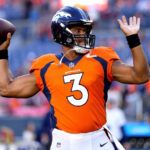 
              Denver Broncos quarterback Russell Wilson (3) warms up prior to an NFL preseason football game against the Minnesota Vikings, Saturday, Aug. 27, 2022, in Denver. (AP Photo/Jack Dempsey)
            
