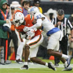 
              Middle Tennessee cornerback Jalen Jackson (23) takes Miami wide receiver Frank Ladson Jr. (8) out of bounds during the first half of an NCAA college football game, Saturday, Sept. 24, 2022, in Miami Gardens, Fla. (AP Photo/Wilfredo Lee)
            