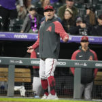 
              Arizona Diamondbacks manager Torey Lovullo reacts after he was ejected along with Ketel Marte for arguing with home plate umpire Hunter Wendelstedt in the seventh inning of a baseball game against the Colorado Rockies, Saturday, Sept. 10, 2022, in Denver. (AP Photo/David Zalubowski)
            