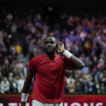 
              Team World's Frances Tiafoe gestures during his singles tennis match against Team Europe's Stefanos Tsitsipas on the third day of the Laver Cup tennis tournament at the O2 arena in London, Sunday, Sept. 25, 2022. (AP Photo/Kin Cheung)
            