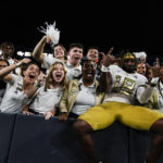 
              Georgia Tech tight end Peje' Harris (18) celebrates in the stands after the team's win against Western Carolina in an NCAA college football game Saturday, Sept. 10, 2022, in Atlanta. (AP Photo/Brynn Anderson)
            