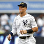 
              New York Yankees center fielder Aaron Judge warms up before a baseball game against the Tampa Bay Rays on Sunday, Sept. 11, 2022, in New York. (AP Photo/Noah K. Murray)
            