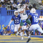 
              Portland State wide receiver Beau Kelly (13) catches a twelve-yard touchdown pass against San Jose State during the second half of an NCAA college football game in San Jose, Calif., Thursday, Sept. 1, 2022. (AP Photo/Godofredo A. Vásquez)
            