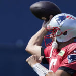 
              New England Patriots quarterback Brian Hoyer passes the ball during an NFL football practice, Wednesday, Sept. 14, 2022, in Foxborough, Mass. (AP Photo/Steven Senne)
            
