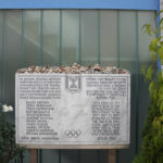 
              FILE - A memorial plaque for the eleven athletes from Israel and one German police officer were killed in a terrorist attack during the Olympic Games 1972, stands at the former accommodation of the Israeli team in the Olympic village in Munich, Germany, Saturday, Aug. 27, 2022. The German and Israeli presidents are to join relatives of the 11 Israeli athletes killed in the attack by Palestinian militants on the 1972 Munich Olympics to mark the 50th anniversary.  (AP Photo/Matthias Schrader, File)
            