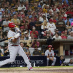 
              St. Louis Cardinals' Albert Pujols hits a single during the seventh inning of the team's baseball game against the San Diego Padres, Wednesday, Sept. 21, 2022, in San Diego. (AP Photo/Gregory Bull)
            