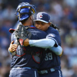 
              Chicago Cubs closing pitcher Manuel Rodriguez (39) celebrates with catcher Yan Gomes, left, after defeating the Colorado Rockies 2-1 in a baseball game Friday, Sept. 16, 2022, in Chicago. (AP Photo/Paul Beaty)
            