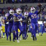 
              Buffalo Bills defensive end Boogie Basham (55) runs back after intercepting a pass during the second half of an NFL football game against the Los Angeles Rams Thursday, Sept. 8, 2022, in Inglewood, Calif. (AP Photo/Mark J. Terrill)
            