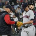 
              Cleveland Guardians manager Terry Francona, left, takes starting pitcher Shane Bieber, front right, out of the baseball game against the Chicago White Sox as catcher Austin Hedges, right, looks on during the eighth inning Thursday, Sept. 22, 2022, in Chicago. (AP Photo/David Banks)
            