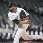 
              Colorado Rockies starting pitcher German Marquez works against the San Francisco Giants during the first inning of a baseball game Wednesday, Sept. 21, 2022, in Denver. (AP Photo/David Zalubowski)
            