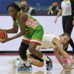 
              Mali's Djeneba N'Diaye, left, steals the ball from Serbia's Nevena Jovanovic during their game at the women's Basketball World Cup in Sydney, Australia, Monday, Sept. 26, 2022. (AP Photo/Rick Rycroft)
            