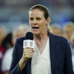 
              Cindy Parlow Cone, president of the U.S. Soccer Federation, speaks during an event with the federation, U.S. Women's National Team Players Association and the U.S. National Soccer Team Players Association signing new collective bargaining agreements following the women's match against Nigeria at Audi Field, Tuesday, Sept. 6, 2022, in Washington. The U.S. won 2-1. (AP Photo/Julio Cortez)
            