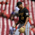 
              Pittsburgh Pirates' Johan Oviedo takes the mound during the fifth inning of the first game of a baseball doubleheader against the Cincinnati Reds in Cincinnati, Tuesday, Sept. 13, 2022. (AP Photo/Aaron Doster)
            