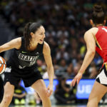 
              Seattle Storm guard Sue Bird (10) drives against Las Vegas Aces guard Kelsey Plum (10) during the first half of Game 4 of a WNBA basketball playoff semifinal Tuesday, Sept. 6, 2022, in Seattle. (AP Photo/Lindsey Wasson)
            