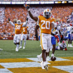 
              Tennessee running back Jaylen Wright (20) celebrates a touchdown during the second half of the team's NCAA college football game against Florida on Saturday, Sept. 24, 2022, in Knoxville, Tenn. Tennessee won 38-33. (AP Photo/Wade Payne)
            